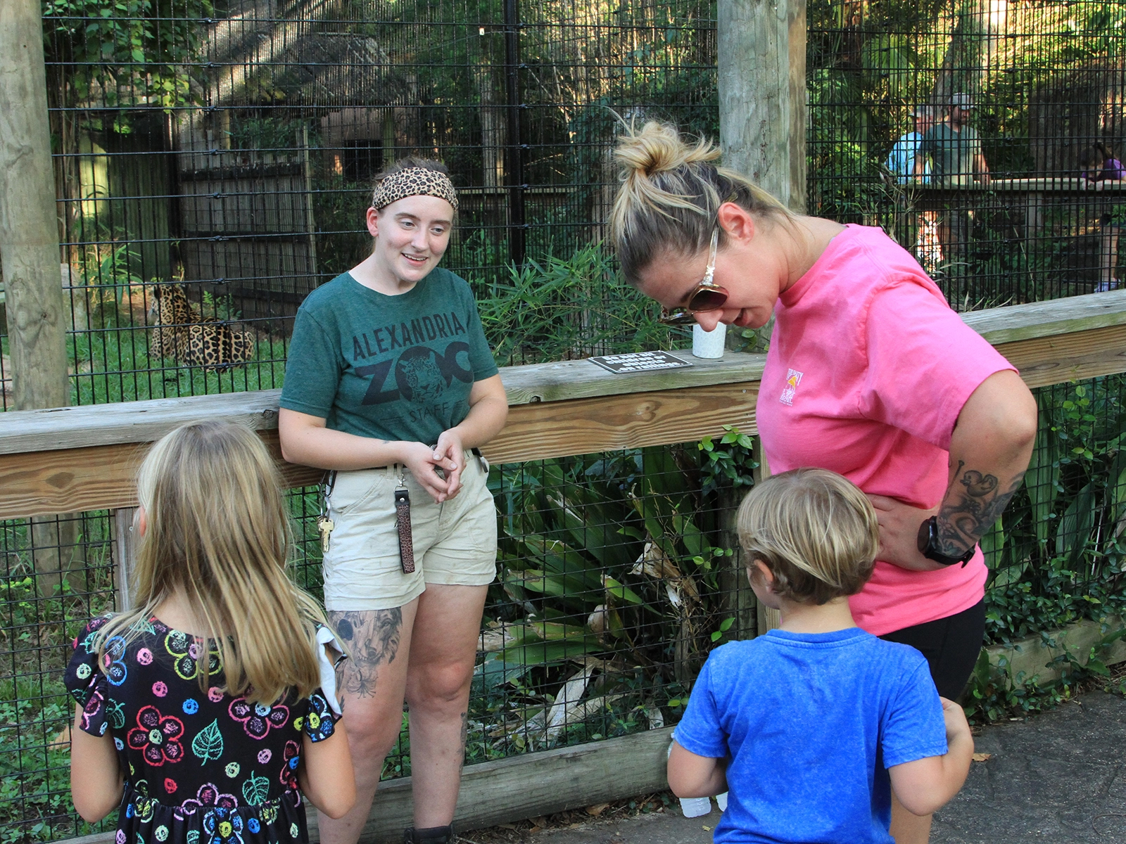 visitors chatting with zookeeper