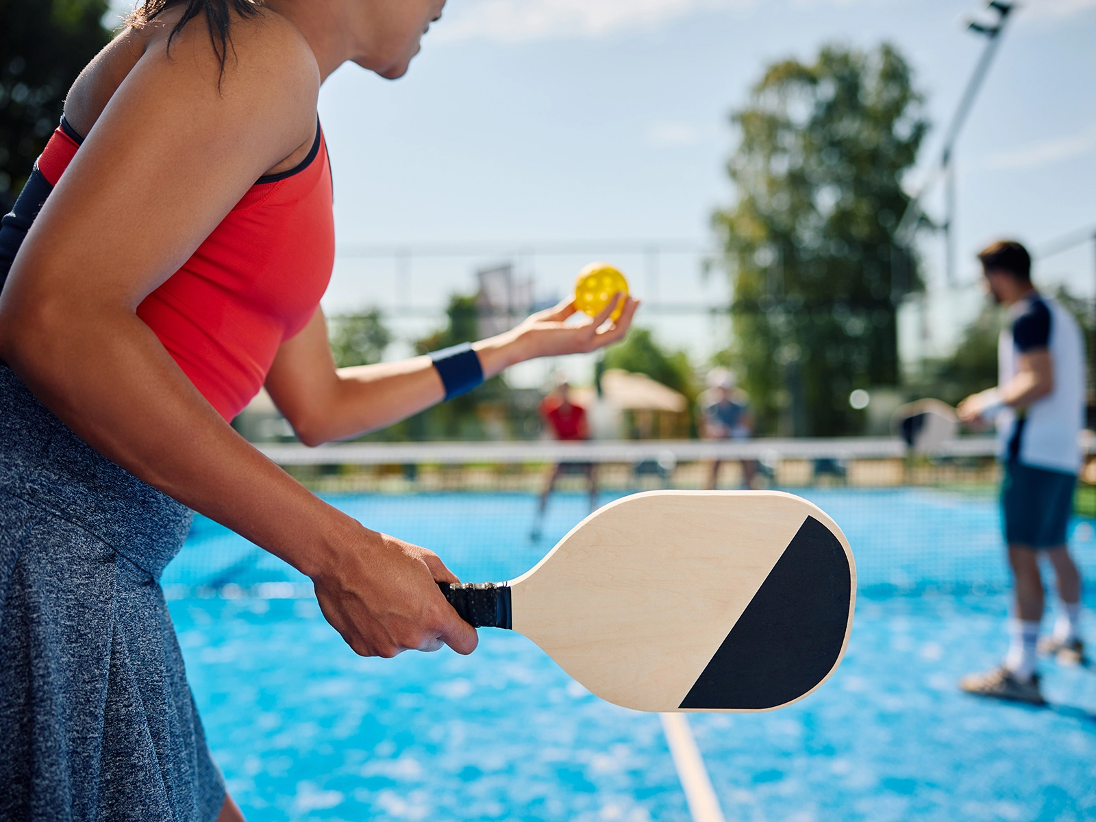 pickleball player about to serve
