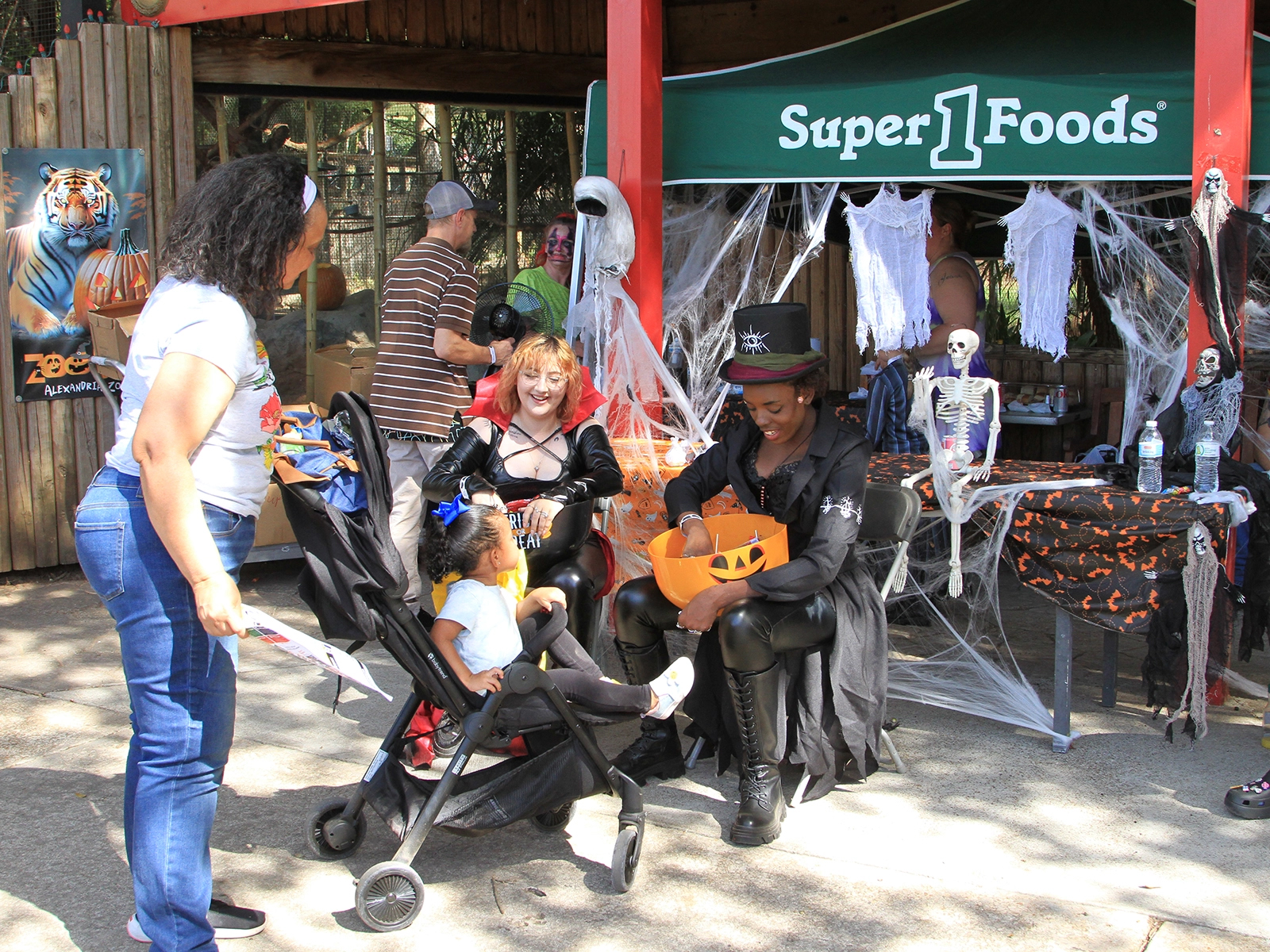 child at trick-or-treat station