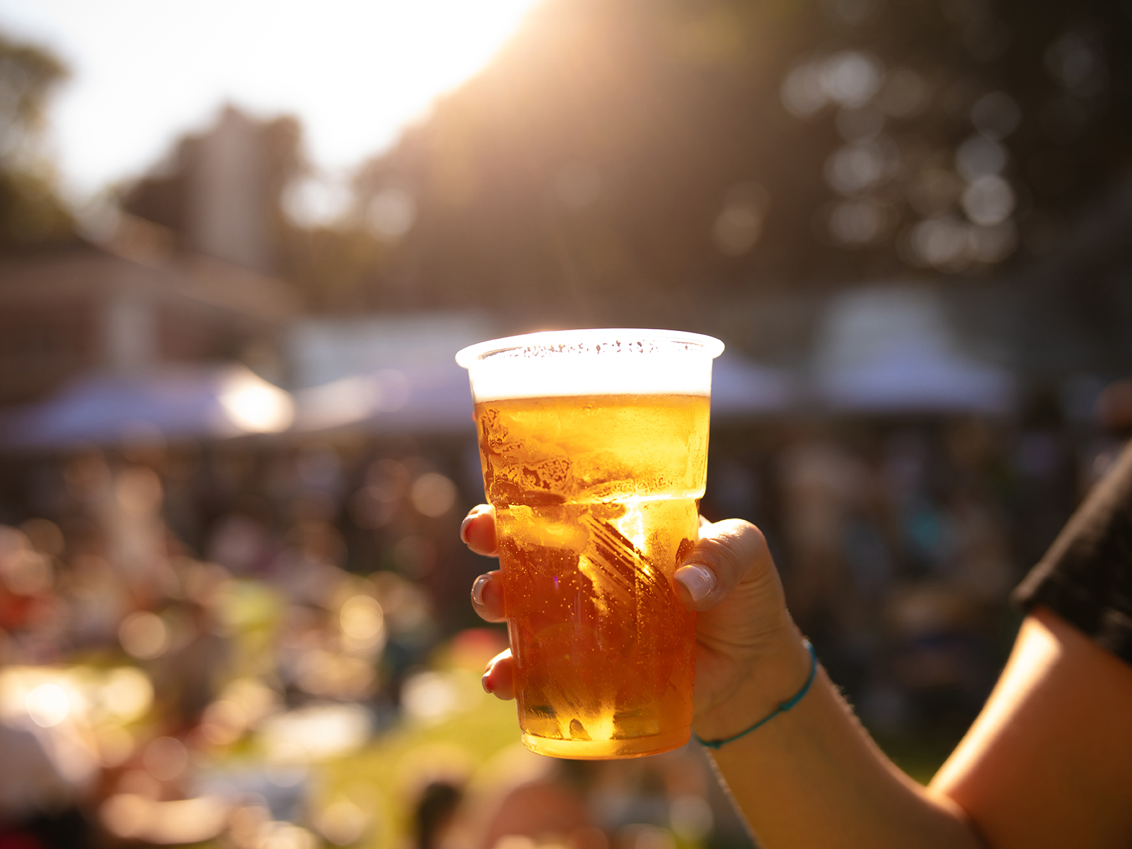 beer in hand at sunset