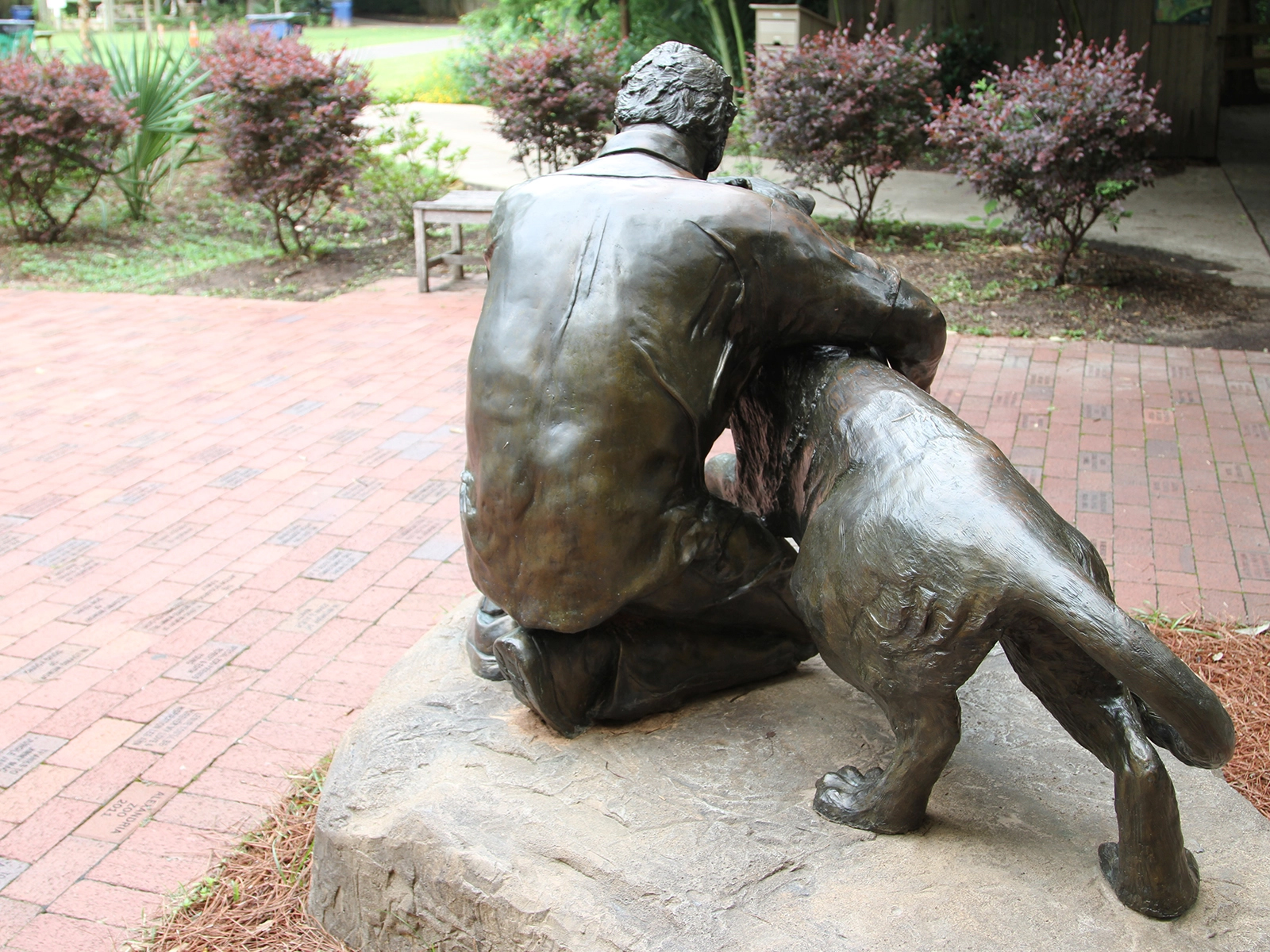 engraved brick area with statue