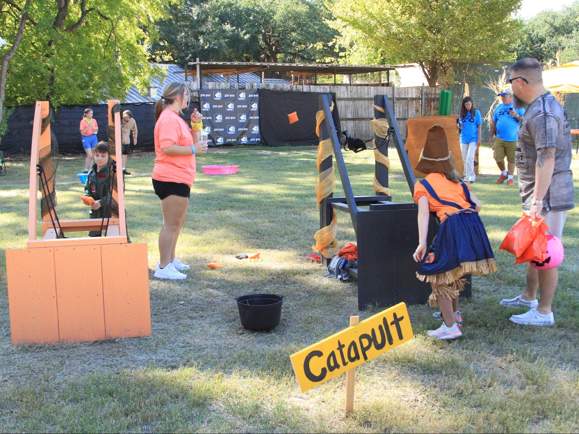 Volunteers Working at Catapult Game