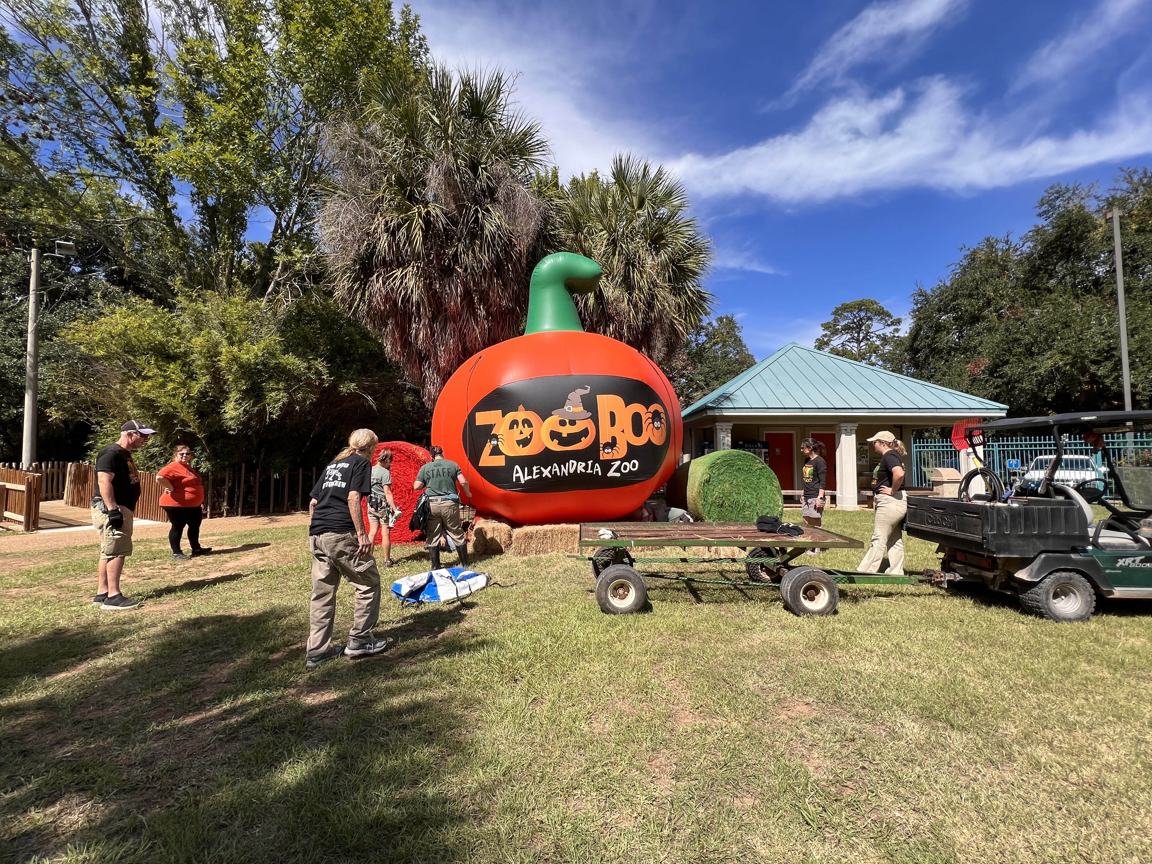 Volunteers Putting Up Giant Pumpkin